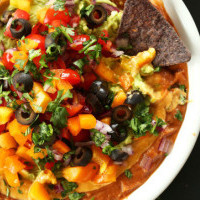Amazing vegan 7 layer Mexican bean dip- perfect for superbowl snacking! (NFL defensive lineman and 300 pound vegan David Carter's recipe!)
