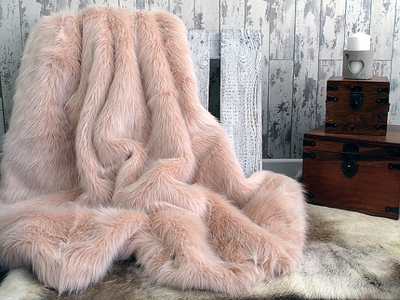 Who wouldn't want to writhe naked on a candy floss baby pink faux fur luxurious throw? $138 @etsy.com