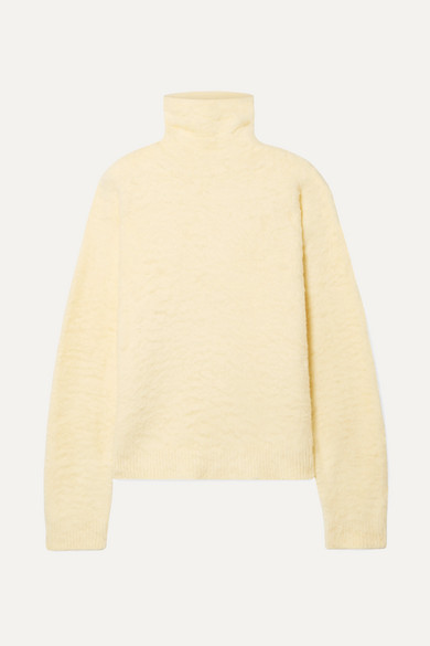 Acne Studios Kristel cotton-blend turtleneck sweater, WAS $560 - is now $336 - 40% OFF, and an additional 15% off if you purchase today @netaporter.com